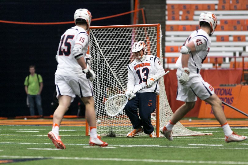 Molloy saves a ball shot at him. 