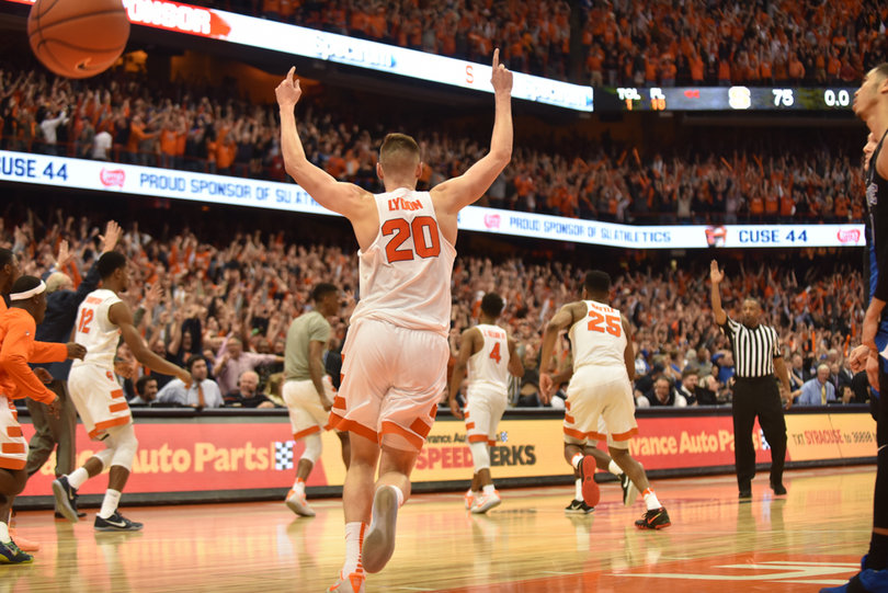 The Orange celebrate Gillon's NBA-range 3-pointer that gave SU the win. 