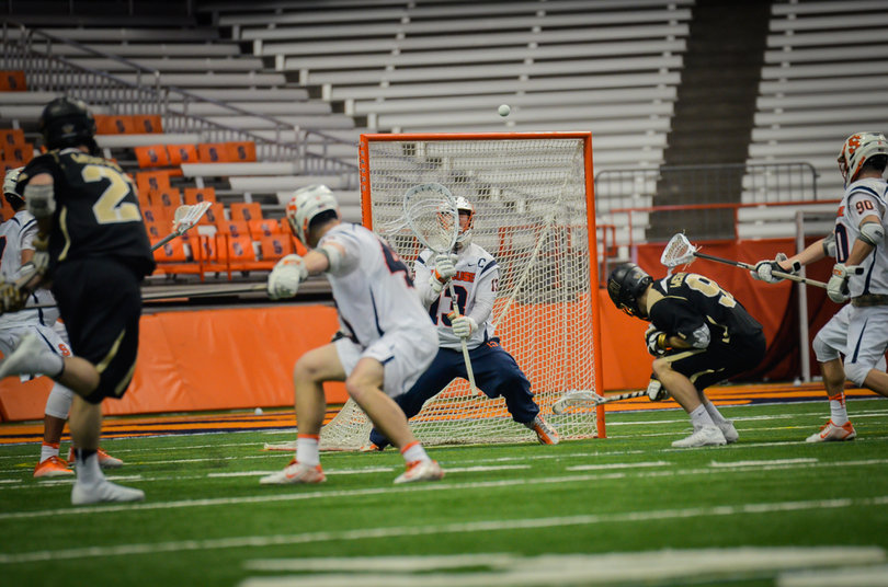Molloy, in his final year at SU, faced 26 shots on Saturday. The final one sizzled by him with 0.5 seconds left on the clock.