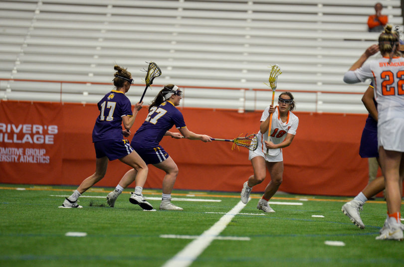 Neena Merola tries to split the defense. 