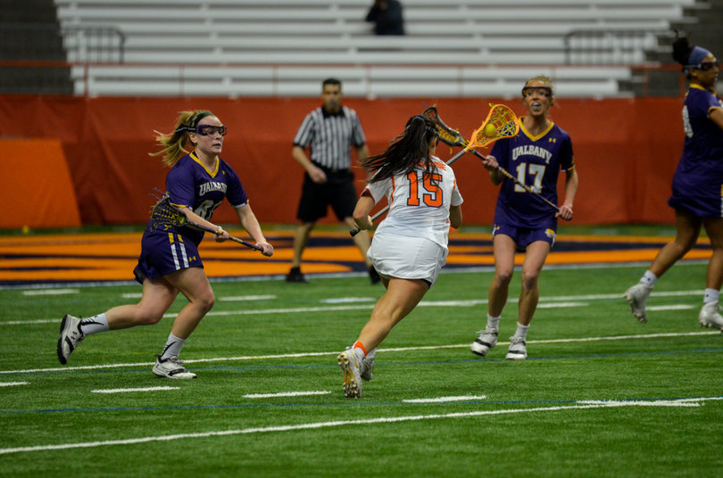 Nicole Levy works her way through the Albany defense. 
