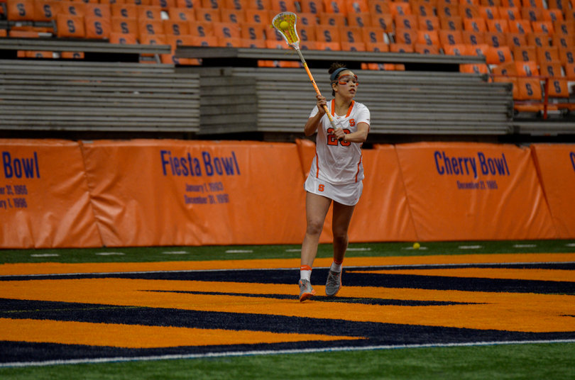 Alie Jimerson carries the ball. 