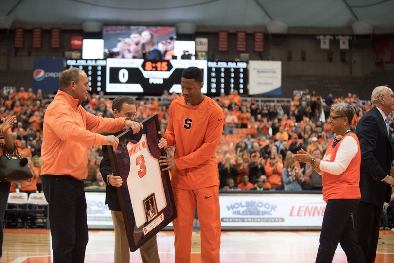 White is honored during the pregame activities. 