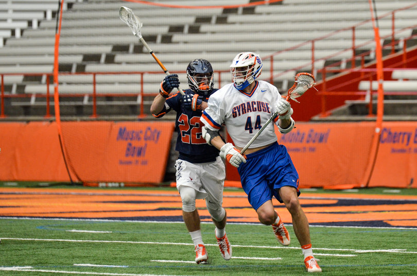 Lane put his first two shots high and wide. Then, he made the Cavaliers pay for sticking a short stick on him.