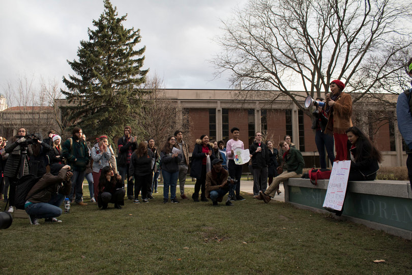 Numerous speakers at the rally, who stood on a bench and used a megaphone so their voices could be heard throughout the Quad, called out Syverud for failing to declare SU a sanctuary campus.