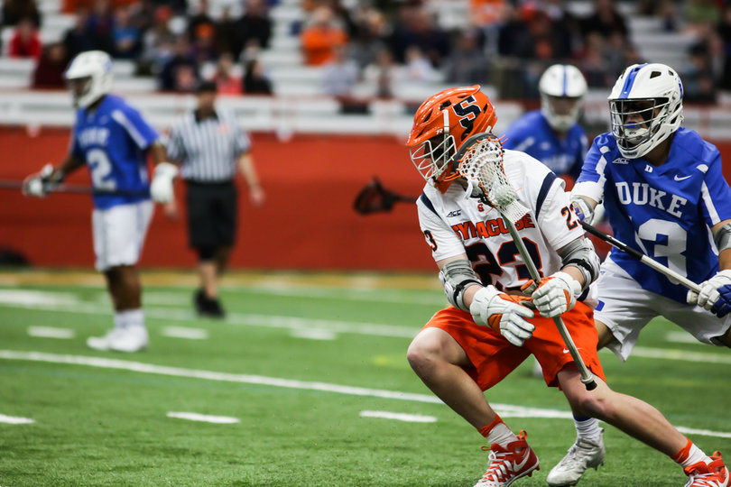 Mariano crouches low and gets ready to pivot on a Duke defender. He finished with three goals and an assist. 