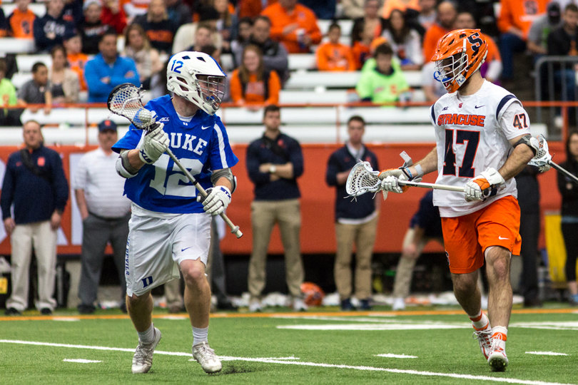 Gillis matches up on defense with Duke midfielder Kevin Quigley.