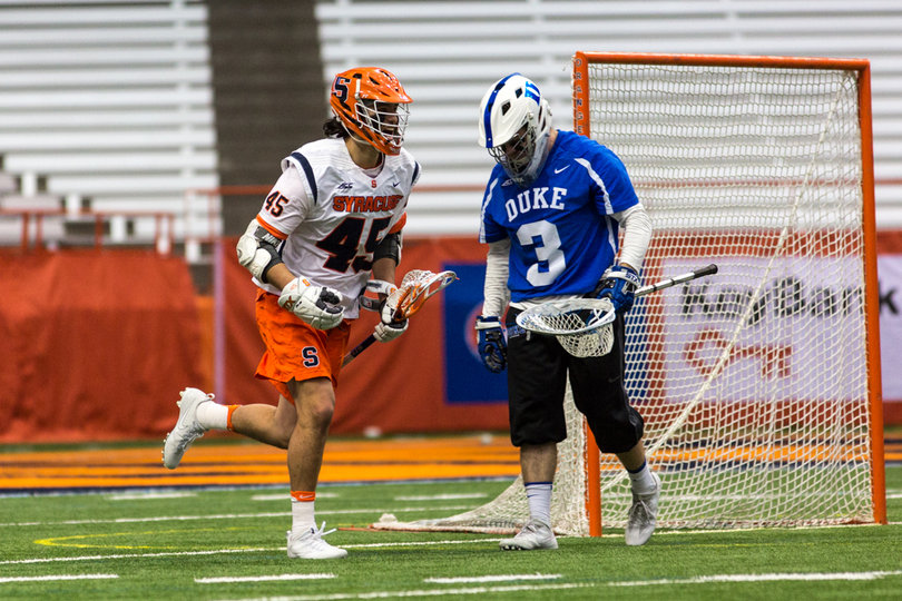 Brendan Bomberry runs past goalie Danny Fowler after the game-winner.