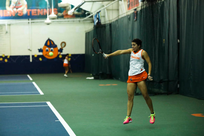 Ramirez returns the backhand.