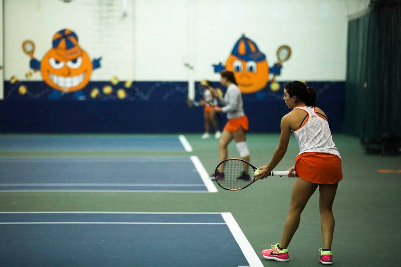 Ramirez pauses before serving. 