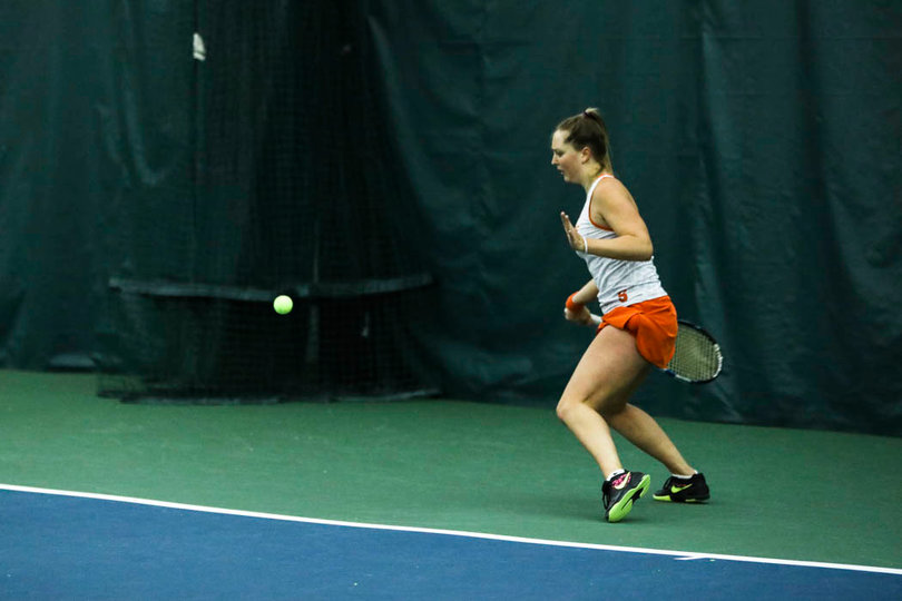 Knutson sizes up the ball.