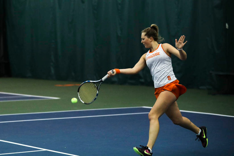 Knutson fires a forehand back. 