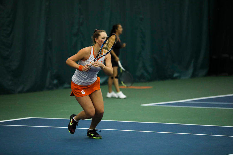Knutson gets ready to recover toward the net. 