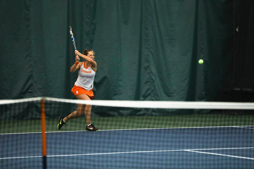 Knutson returns a strong backhand. 