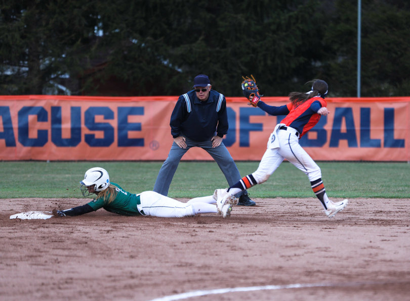 Junior shortstop Sammy Ferndandez sweeps a tag on a Bearcats base stealer. 