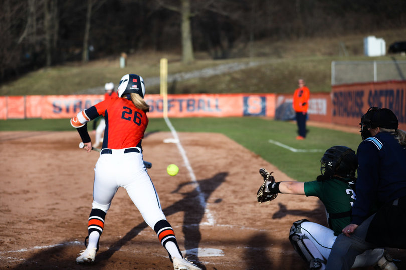 Freshman outfielder Toni Martin lays down a bunt. 