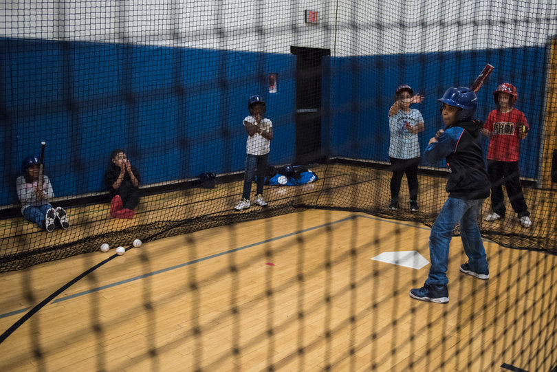 Thirty-four volunteer coaches assist with RBI, giving baseball and softball opportunities to Syracuse’s inner-city kids.