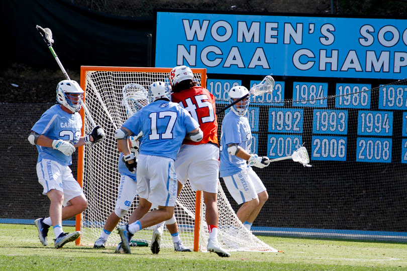 SU's Brendan Bomberry tried to fire through UNC defenders. 