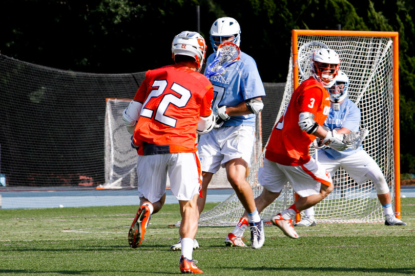 Jordan Evans tries to put a move on a defender.