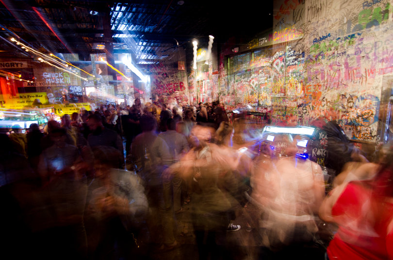 Students dance, enjoying their last night at Chuck's.