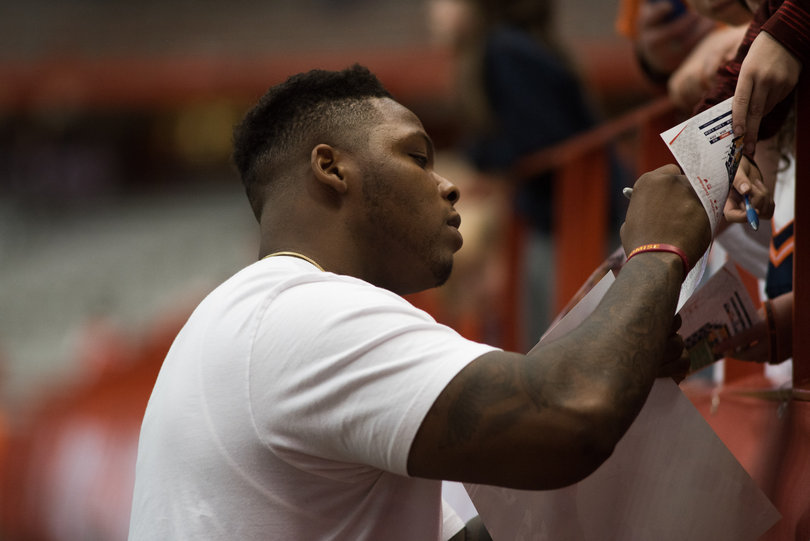 Former SU defensive tackle and current New York Giant Jay Bromley signed autographs for fans. 