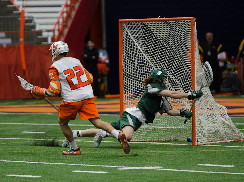 Evans runs to celebrate after one of his three goals. 