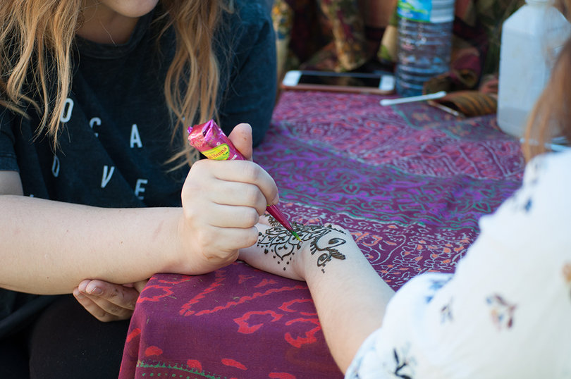 Henna tattoos gave Earthfest attendees a chance to leave with more than they came with.