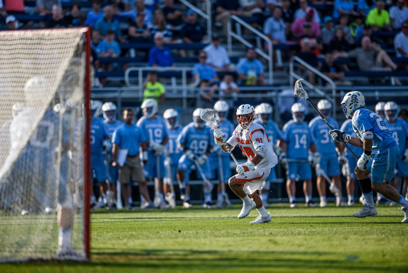 Salcido stares down the North Carolina goal with the ball in his stick.