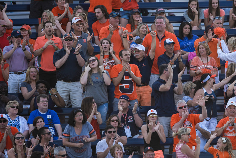 Fans cheer, rooting on Syracuse at Koskinen Stadium in Durham, North Carolina. 