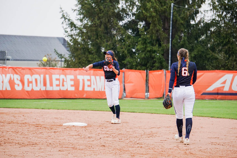 Sammy Fernandez (left) scored the game-winning run after Hansen's (right) walk-off single.