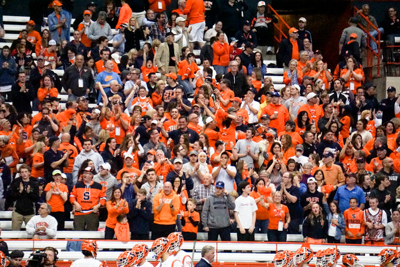 Syracuse fans celebrate a goal. 