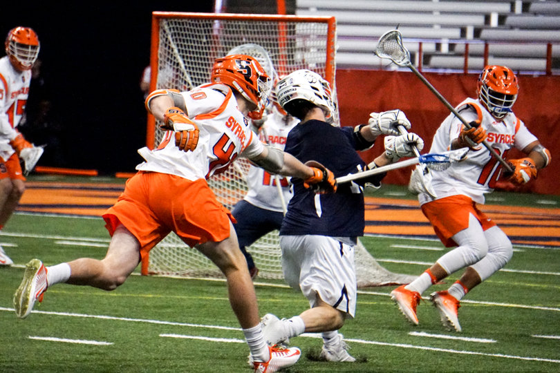 Reeves drew double-teams and triple-teams because of his dangerous offensive game and knack for getting to the cage. Tyson Bomberry (18) helped defense on Reeves. 