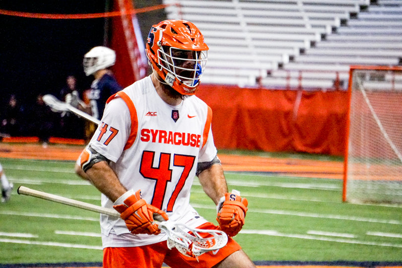 Redshirt senior defensive midfielder Joe Gillis celebrates a Syracuse goal. 