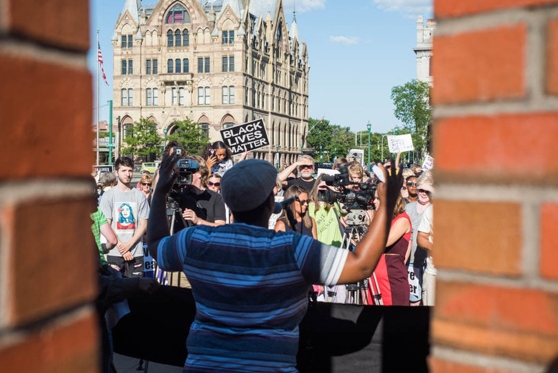 About 500 people gathered in downtown Syracuse at 5 p.m. in response to Saturday's violent white supremacist riots in Charlottesville, Virginia.