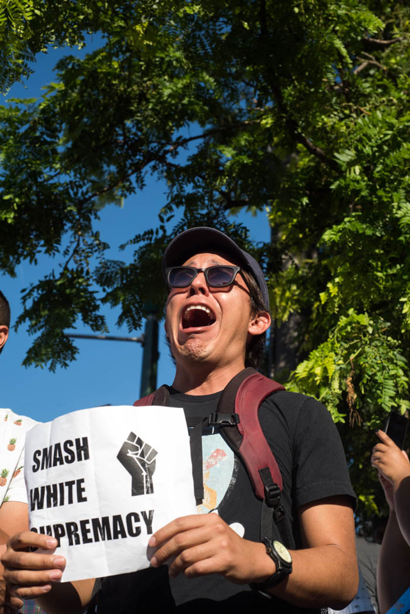 Andre Habet, 27, chants, "What do we want? Justice. When do we want it? Now."