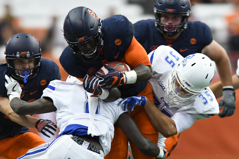 CCSU players wrap up Pierre. 