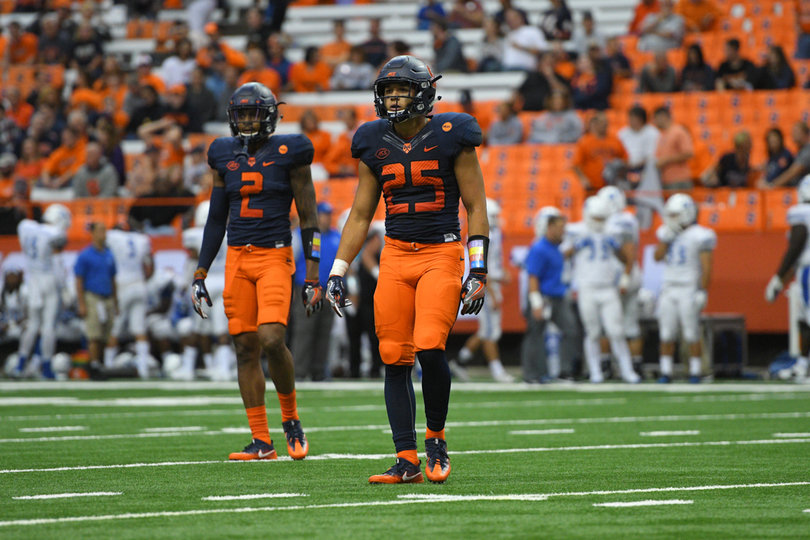 Jordan Martin (left) and Kielan Whitner helped anchor the defense as middle linebackers. 