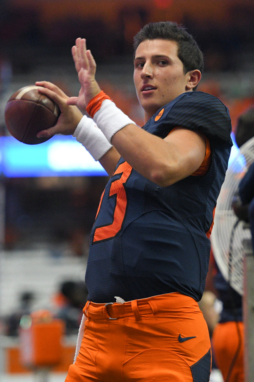Tommy DeVito, an Elite Eleven QB, warms up his arm. 