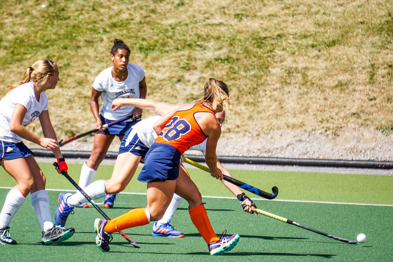Senior starter Erin Gillingham stretches her stick out to corral the ball against the Bison. 