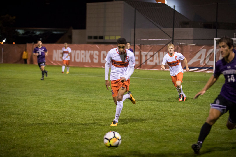 Freshman midfielder Djimon Johnson tracks down the ball. 