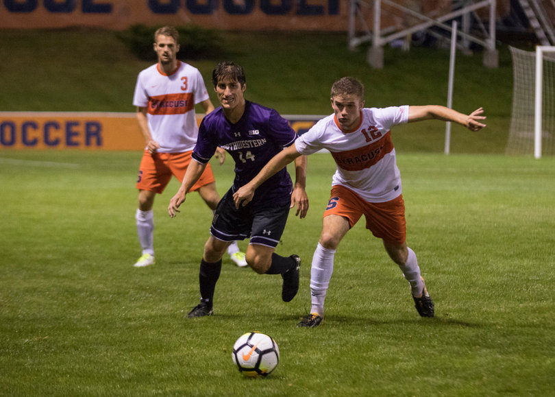 Ricks fights for position on a loose ball. 
