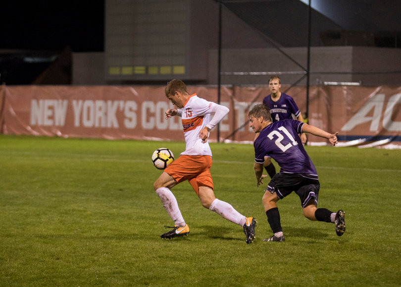 Freshman midfielder Simon Triantafillou corrals the ball. 