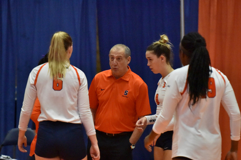 Leonid Yelin talks to his players during the game.