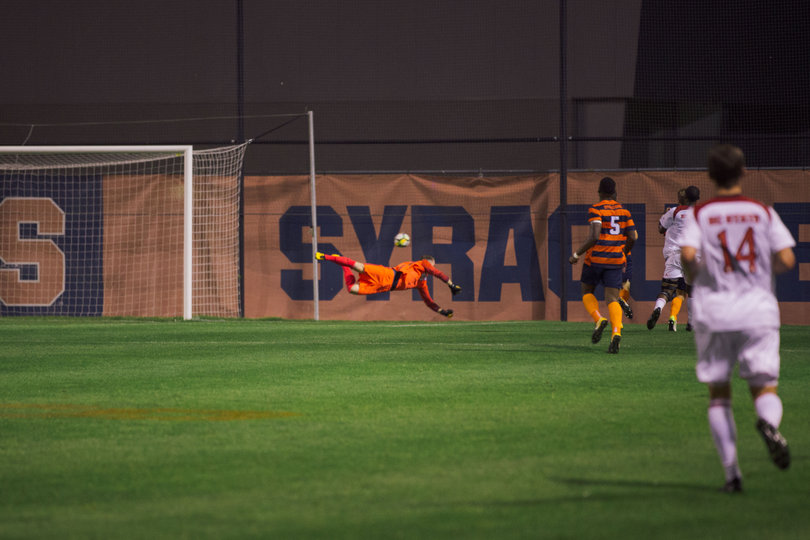 SU goalkeeper Hendrik Hilpert dives for a ball.