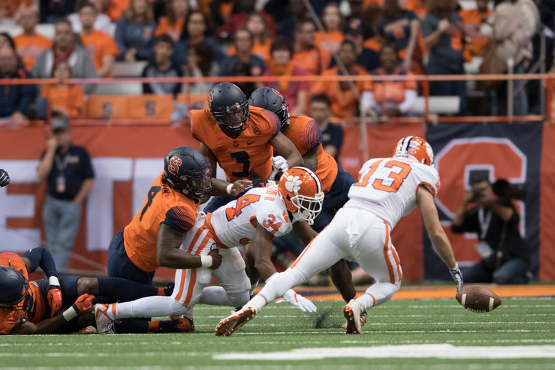 Clemson receiver Hunter Renfrow dives for a loose ball.