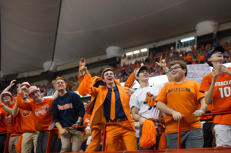 Students stormed the field before either team could even reach midfield after the clock ran out.