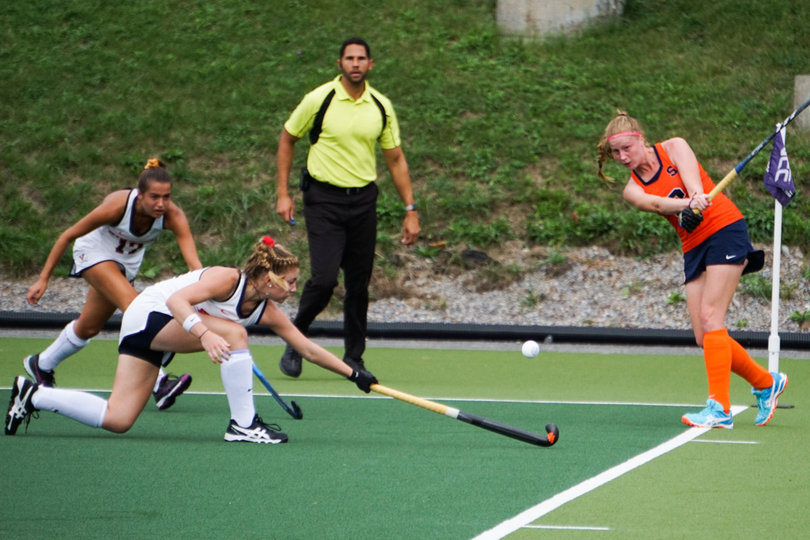 Florine Hogendoorn plays a pass up the wing past UVA's press.