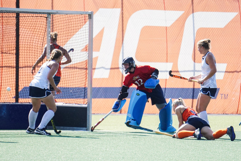 Caroline Cady (bottom right) scored SU's third goal on an assist from Lagerweij.