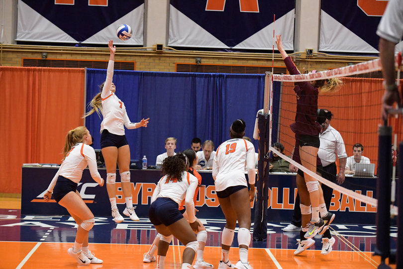 Saada skies to flick a ball over into VT territory.