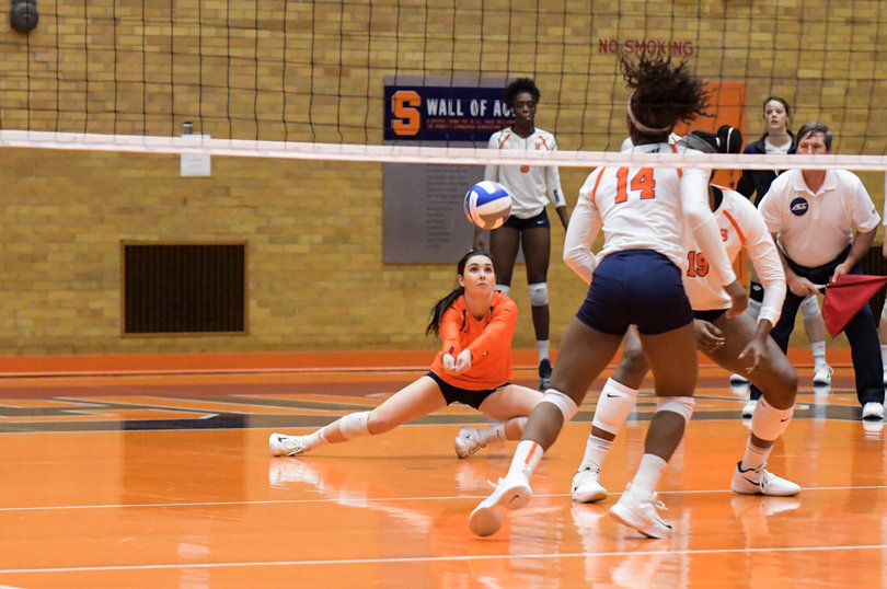 Sand gets low to keep a ball alive.
